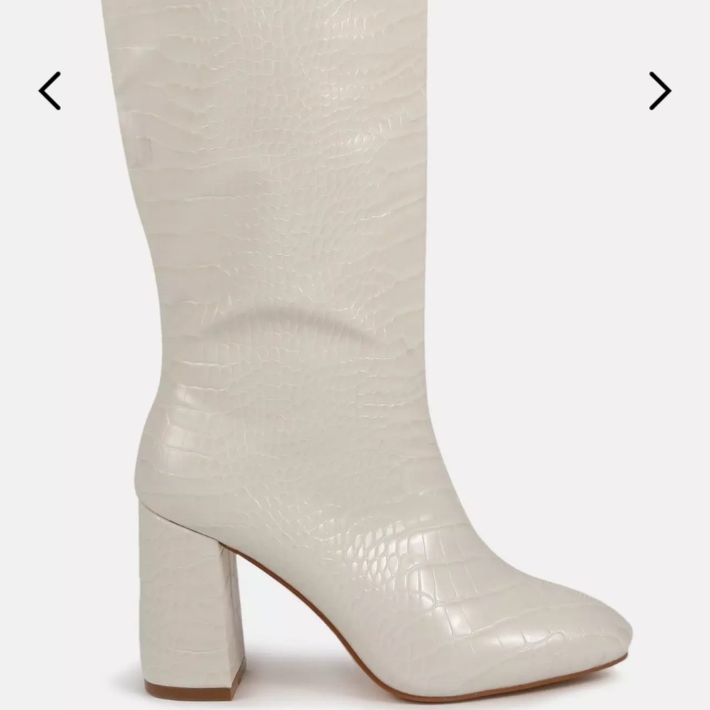 Knee high heeled boots